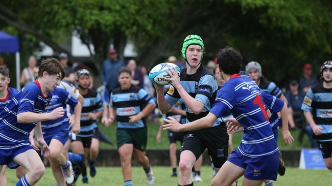 Day 1 of the King of the Country junior rugby union tournament at the Gold Coast Eagles Rugby Union Club.Maroochydore Swans (BLUE AND BLACK) vs USQ Saints (Blue ) Maroochydore Player No USQ Player No Pic Mike Batterham