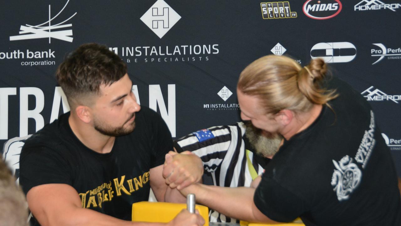 Andy Boskovski (left) from Melbourne Table Kings, won the super heavyweight division of that Meatstock Toowoomba arm wrestling competition, beating Jacob Tuxworth, out of Brisbane.