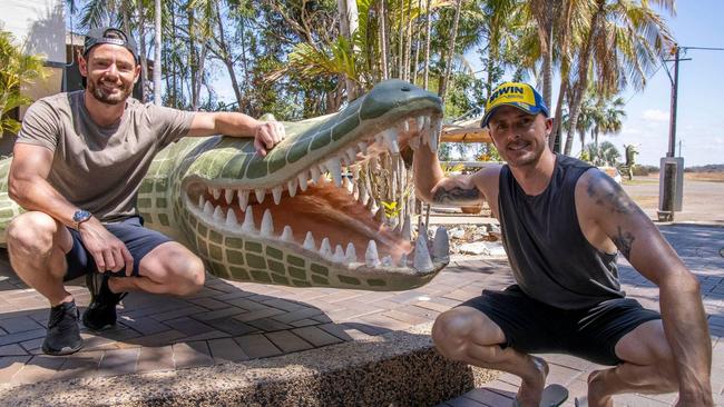 Supercar drivers Mark Winterbottom and Scott Pye take time out to see the jumping crocodiles.