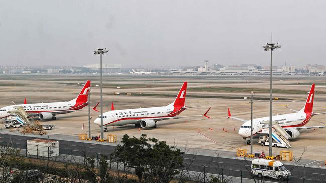 Three Boeing 737 MAX 8 planes from Shanghai Airlines parked at Shanghai Hongqiao International Airport in Shanghai. Picture: STR/AFP