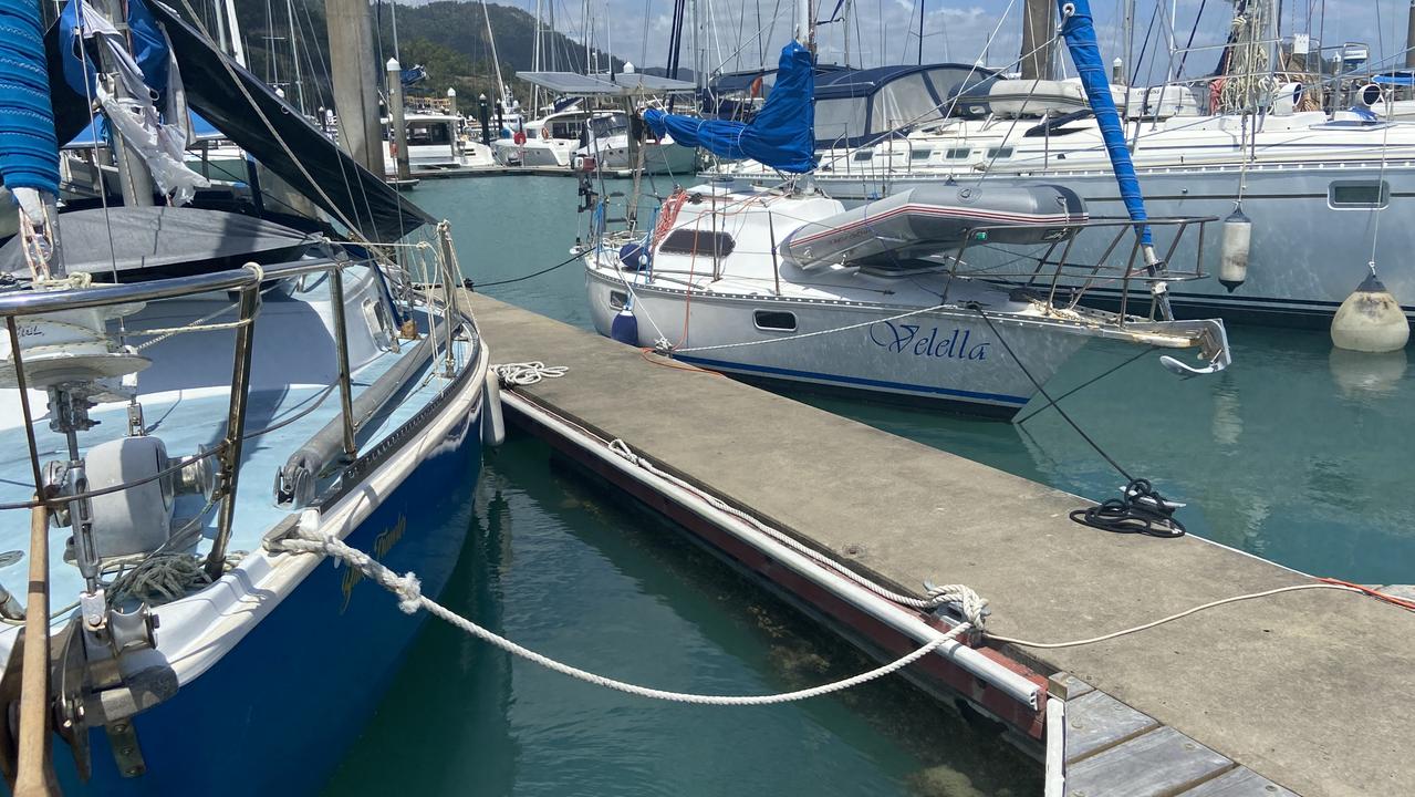 Jim Vaughan’s boat ‘Blue Trawler’, pictured left, is next door to the deceased man’s boat, pictured right. Picture: Kirra Grimes