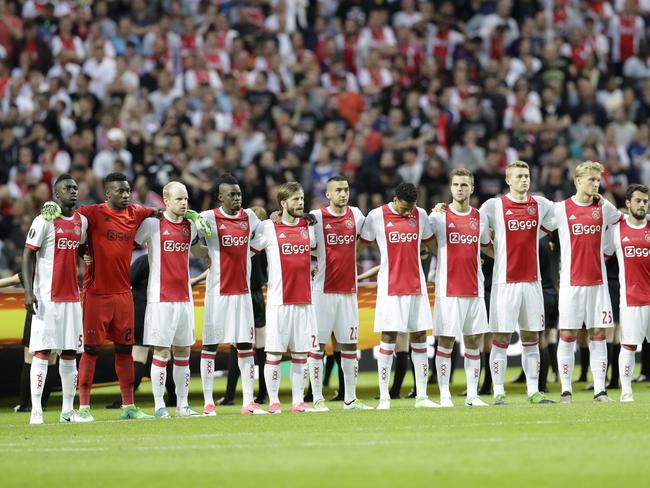 Ajax's team observe a minute of silence