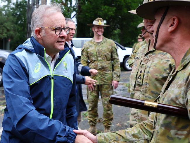 BRISBANE, AUSTRALIA - MARCH 9:  Prime Minister Anthony Albanese during a visit to the Gallipoli Barracks on March 9, 2025 in Brisbane, Australia. Australia's east coast is experiencing severe weather as ex-Tropical Cyclone Alfred moves south. While downgraded from cyclone status, the weather system continues to bring damaging winds, heavy rainfall, and flash flooding, particularly in the Gold Coast and northern NSW regions. Authorities have issued severe weather warnings, and coastal areas remain at risk of significant erosion and hazardous surf conditions. Residents are urged to stay updated on local warnings, avoid floodwaters, and prepare for ongoing disruptions. (Photo by Tertius Pickard - Pool/Getty Images)