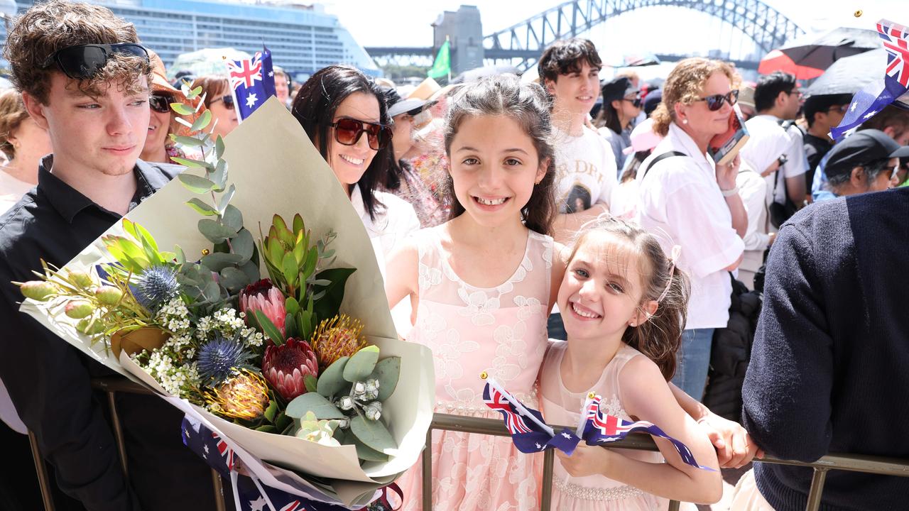 Later in the day the King and Queen visited the Opera House. Grace Wright, 9 and Charlotte Finn 6. Picture: Rohan Kelly