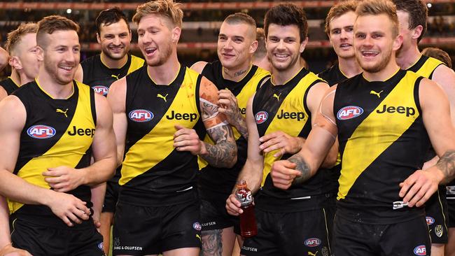 Richmond players celebrate their qualifying final win against Geelong.