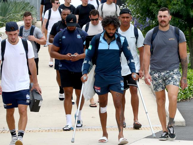 Josh Addo-Carr (C) on crutches after injuring his big toe on the left foot during last nights game. Picture: Toby Zerna