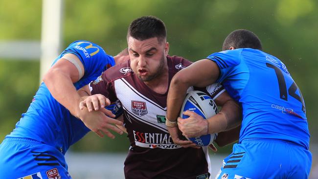 Sam Coster does the hard yards against Mackay. Picture: SMP Images