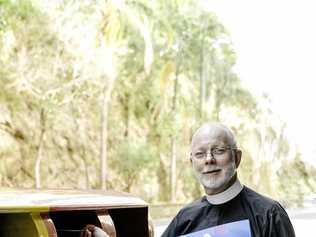 VOTE CAST: The Dean of Brisbane Dr Peter Catt posts his yes vote in the city recently. He explains why his church and many others are in favour of marriage equality.