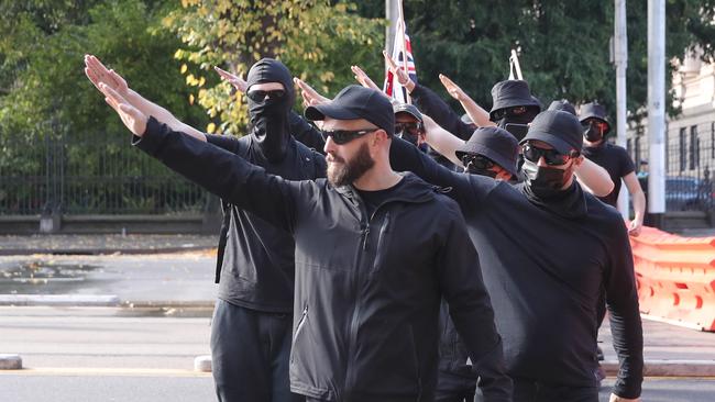 Far right activist Thomas Sewell at a May 2023 rally giving a Nazi salute. Picture: NCA NewsWire / David Crosling