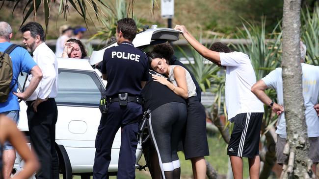 Friends and family gathered at Greenmount beach this morning after McMcnamara’s tragic death. Picture: Tweed Daily News