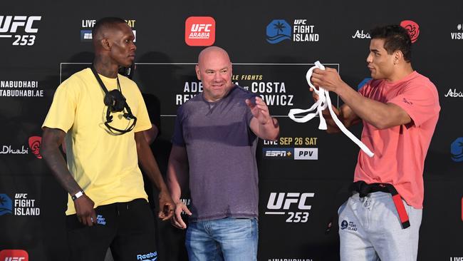 ABU DHABI, UNITED ARAB EMIRATES - SEPTEMBER 25: In this handout image provided by UFC,(L-R) Opponents Israel Adesanya of Nigeria and Paulo Costa of Brazil face off during the UFC 253 weigh-in on September 25, 2020 at Flash Forum on UFC Fight Island, Abu Dhabi, United Arab Emirates. (Photo by Josh Hedges/Zuffa LLC via Getty Images)