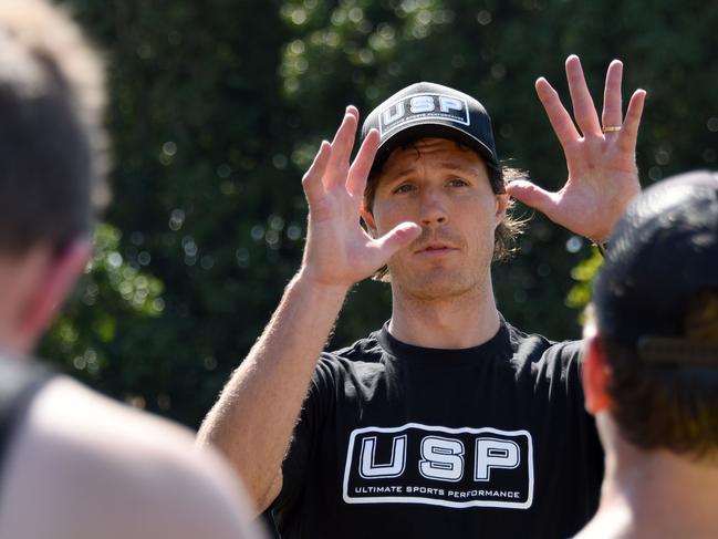 Sydney AFL player Kurt Tippett coaching at a AFL-offseason training camp. (Photo/Steve Holland)