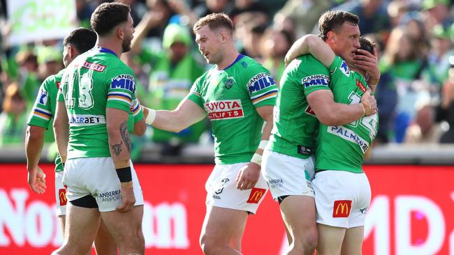 CANBERRA, AUSTRALIA - AUGUST 27: Tom Starling of the Raiders celebrates with teammates after scoring a try during the round 24 NRL match between the Canberra Raiders and the Manly Sea Eagles at GIO Stadium on August 27, 2022 in Canberra, Australia. (Photo by Jason McCawley/Getty Images)