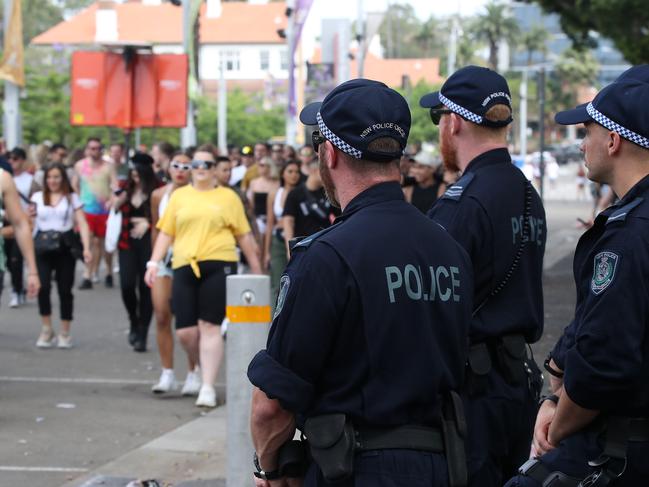 Revellers arrive at Festival X in Olympic Park this afternoon with Calvin Harris headlining the dance festival. A heavy police and security presence is on-hand outside and inside the venue as people show their tickets and ID to get in.