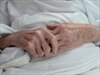 An elderly patients hands.