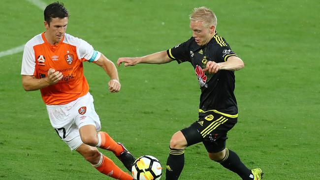 Adam Parkhouse is confronted by Roar’s Matt McKay.