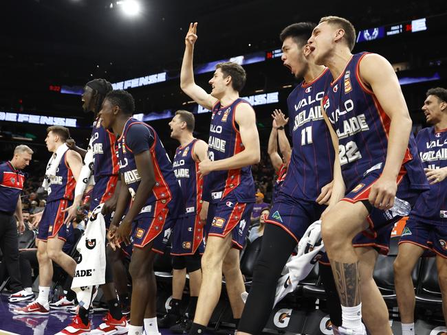 The Adelaide 36ers celebrate after beating the Phoenix Suns 134-124 in a pre-season game. Picture: Getty Images.