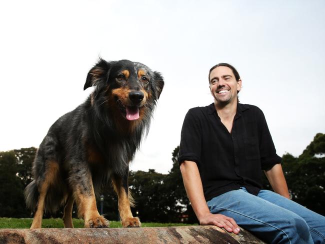 Ryan Tate with his dog Ari. Picture: Tim Hunter