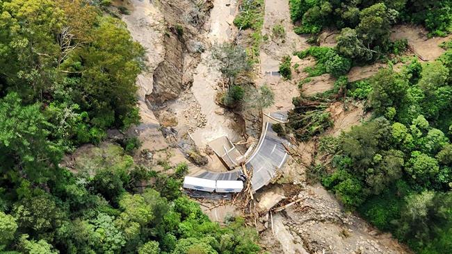 A truck stranded on a road covered with debris near Wairoa on the east coast of New Zealand's North Island. Picture: NZ Defence Force.