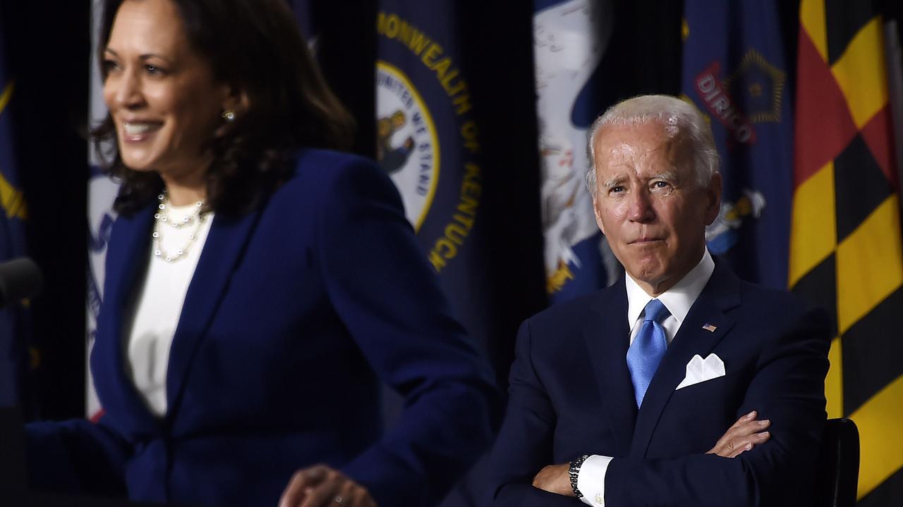 Mr Biden sat nearby as Ms Harris spoke. Picture: Olivier Douliery/AFP