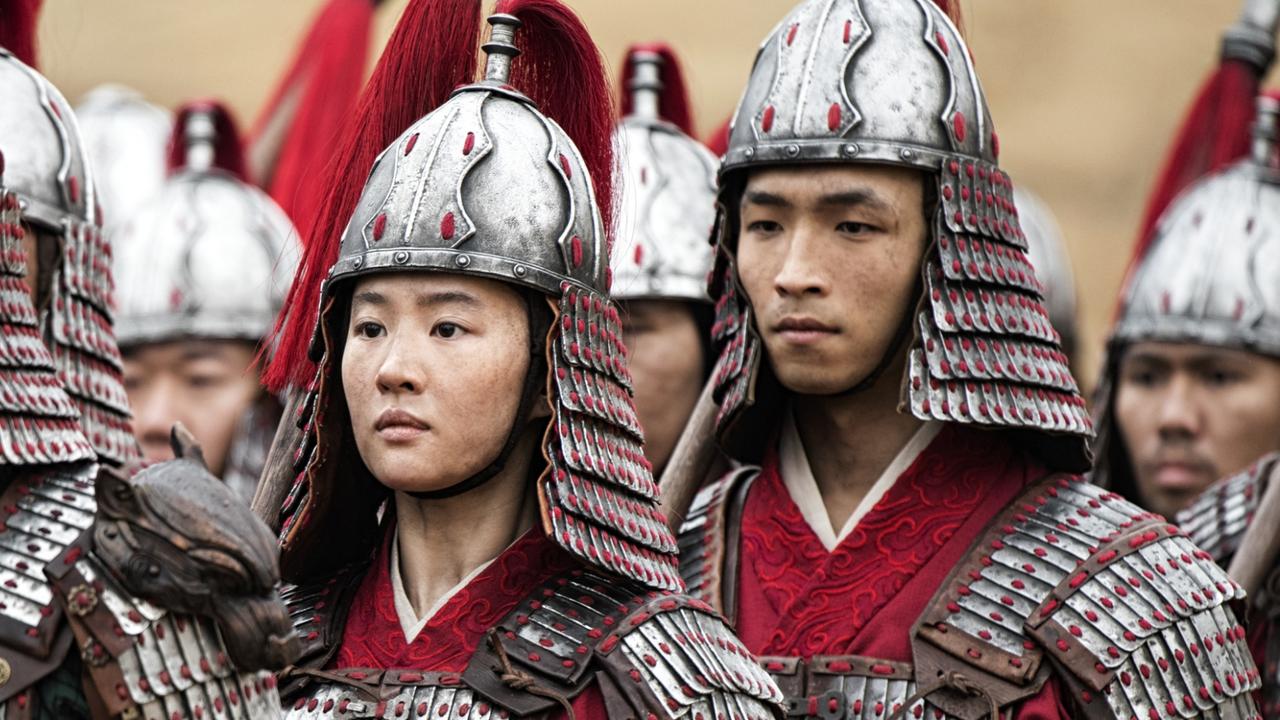 Yoson An (right) in a scene from Disney’s live-action remake of Mulan.