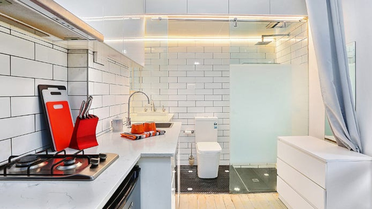 When space is scarce, it makes total sense to put the crapper in the kitchen