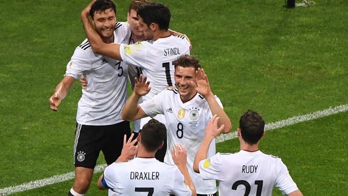 Germany's forward Timo Werner (2L) celebrates with team mates after scoring during the 2017 Confederations Cup semi-final football match between Germany and Mexico at the Fisht Stadium in Sochi on June 29, 2017. / AFP PHOTO / Patrik STOLLARZ