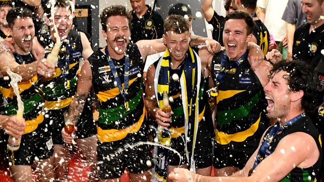 Dromana celebrate in the rooms after winning the 2023 MPFNL Division One Seniors Grand Final. (Photo by Josh Chadwick)