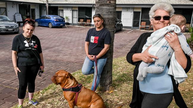 OCTOBER 23, 2024: Angie, Cass Richardson with her dog Armani and Rose Brahimi with her grandson she is raising are staying in the emergency accommodation at Port Noarlunga Motel. Picture: Brenton Edwards