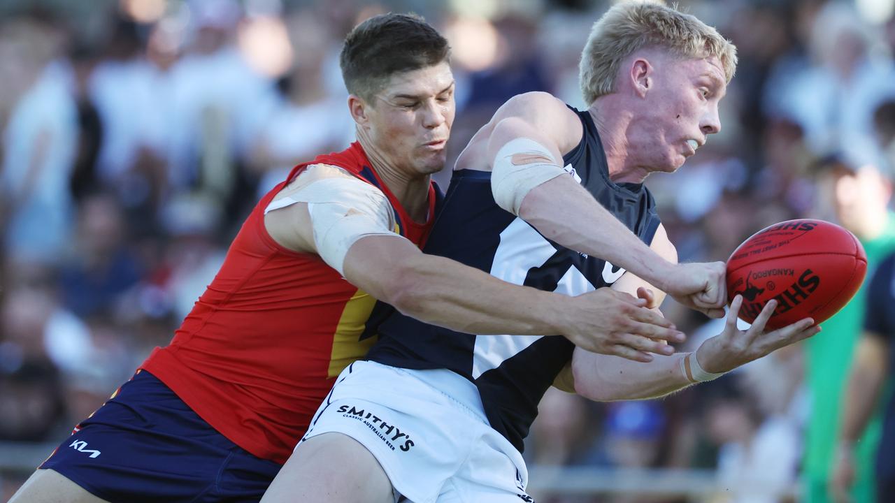 Sturt’s Tom Lewis lays a strong tackle on Ethan Stanley while representing the SANFL against the VFL in Tanunda last month. Picture: David Mariuz/SANFL