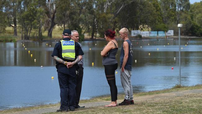 Police and family at the scene of the tragedy. Picture: Josie Hayden