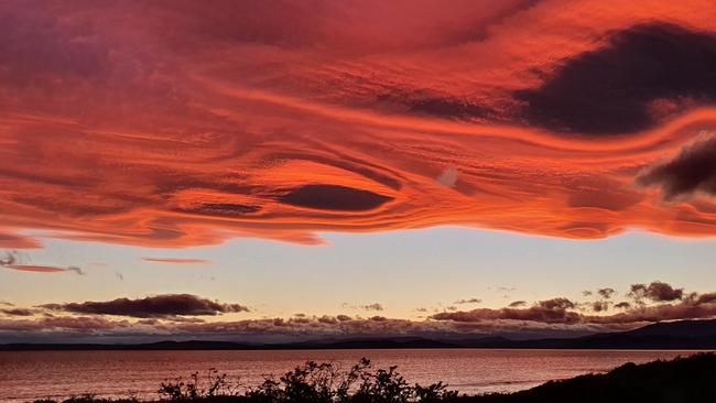 The spectacular sunset over Carlton Beach last Sunday. The Bureau of Meteorology explained this haunting effect of the Halloween sky was caused by “lenticular clouds which are just about stationary … building up on top of one another.”