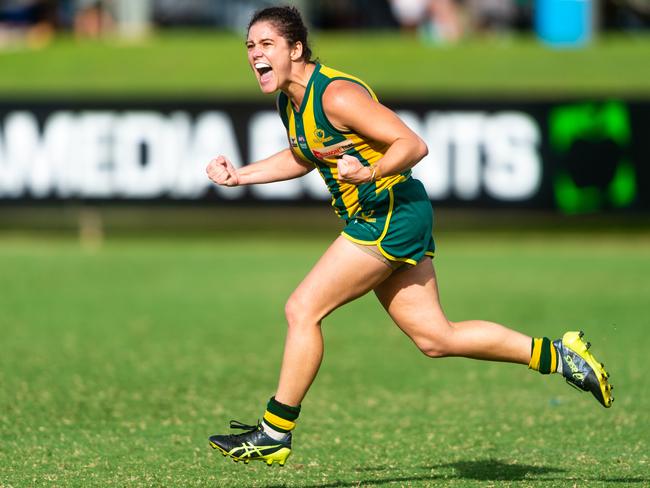 Amy Chittick celebrates a crucial goal for PINT during the 2020-21 NTFL Women's Premier League Grand Final against Darwin Buffettes. Picture: Che Chorley