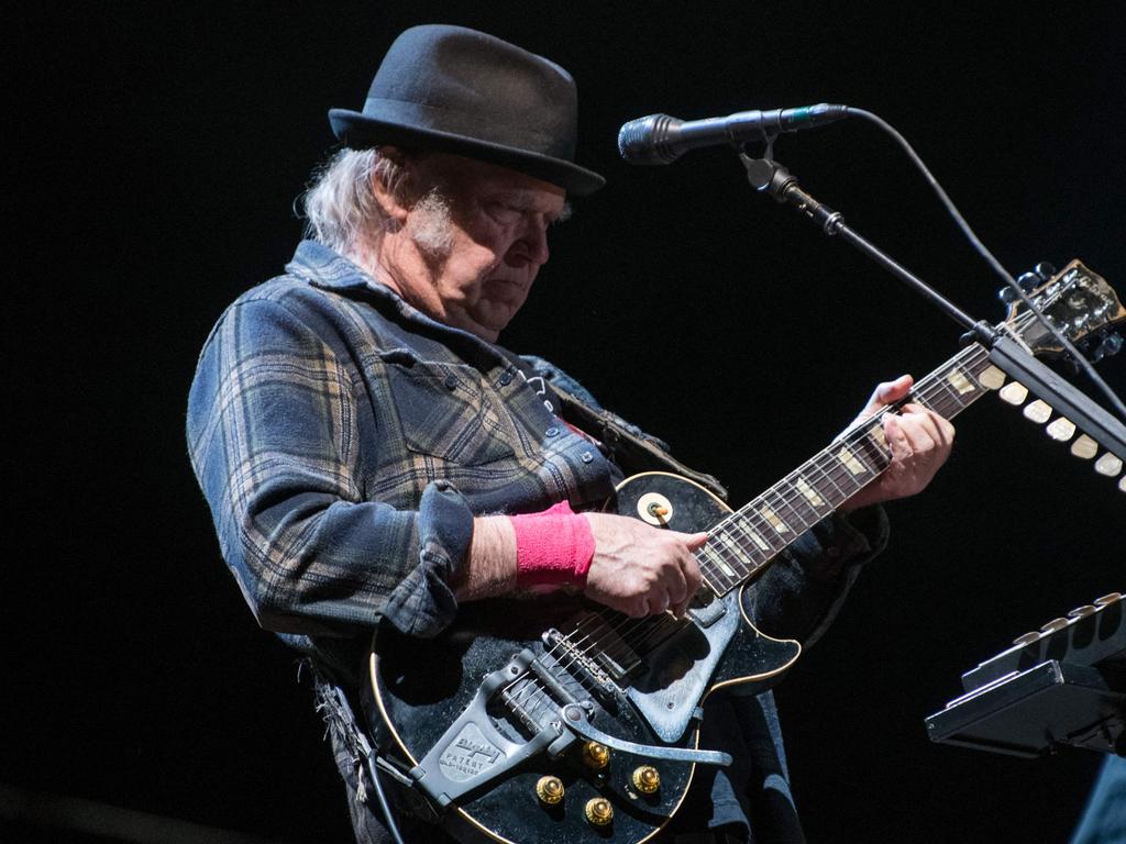 The Honey Sliders will perform Neil Young’s iconic album Harvest at the Armitage Centre. (Photo by Alice Chiche / AFP)