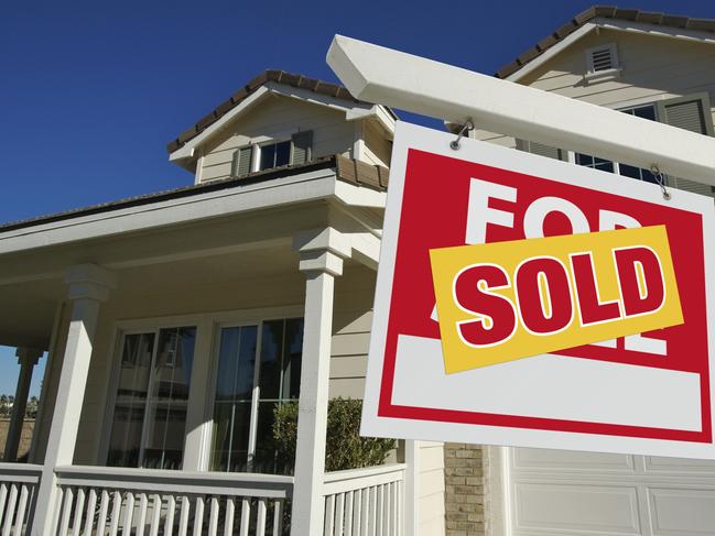 Sold Home For Sale Sign in Front of New House