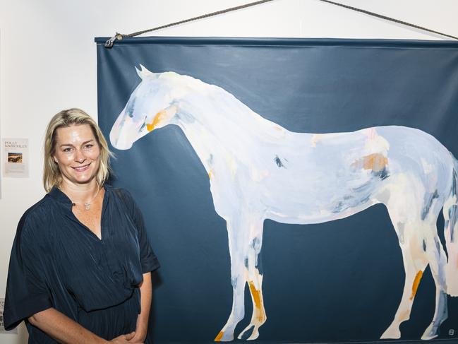 Tasmanian artist and The Next Big Thing finalist Harriet Links with her work Head in the Clouds at The Toowoomba Gallery, Friday, March 1, 2024. Picture: Kevin Farmer