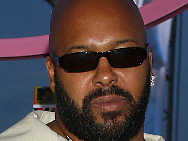 AUGUST 29, 2004 : Rapper Marion "Suge" Knight arrives at the 2004 MTV Video Music Awards in Miami, Florida in 29/08/04 file photo, has been reported to have been shot in the leg during a party hosted by hip hop artist West at Shore Club early on 28/08/05. Knight/Singer F/L
