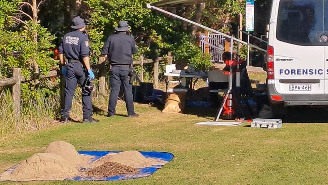 Forensic police at the Coffs Harbour scene where human remains were found on Tuesday. Picture: Toni Moon.