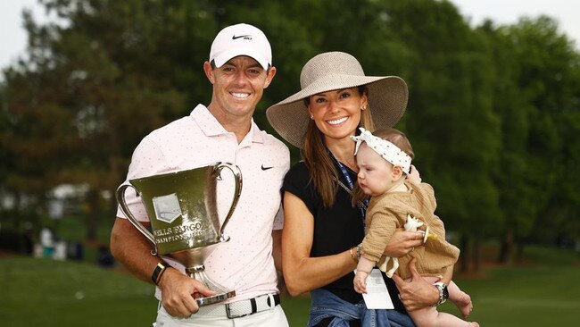 Rory McIlroy celebrates with his wife Erica and daughter Poppy after winning during the final round of the 2021 Wells Fargo Championship. Picture: Getty Images