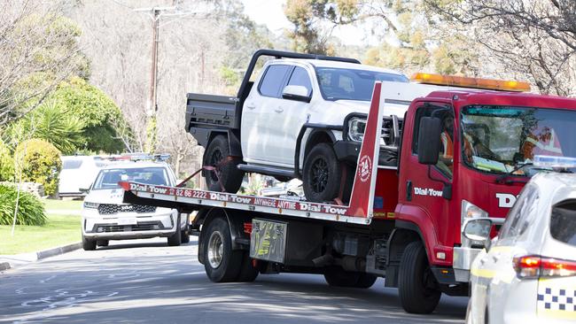 The ute involved is taken away. Picture: Brett Hartwig