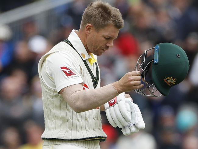 Australia's David Warner leaves the field after being dismissed during day one of the fourth Ashes Test cricket match between England and Australia at Old Trafford in Manchester, England, Wednesday Sept 4, 2019. (AP Photo/Rui Vieira)