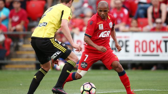 Matchwinner — Henrique runs with the ball for Adelaide United against Wellington Phoenix. Picture: Morne de Klerk (Getty Images)