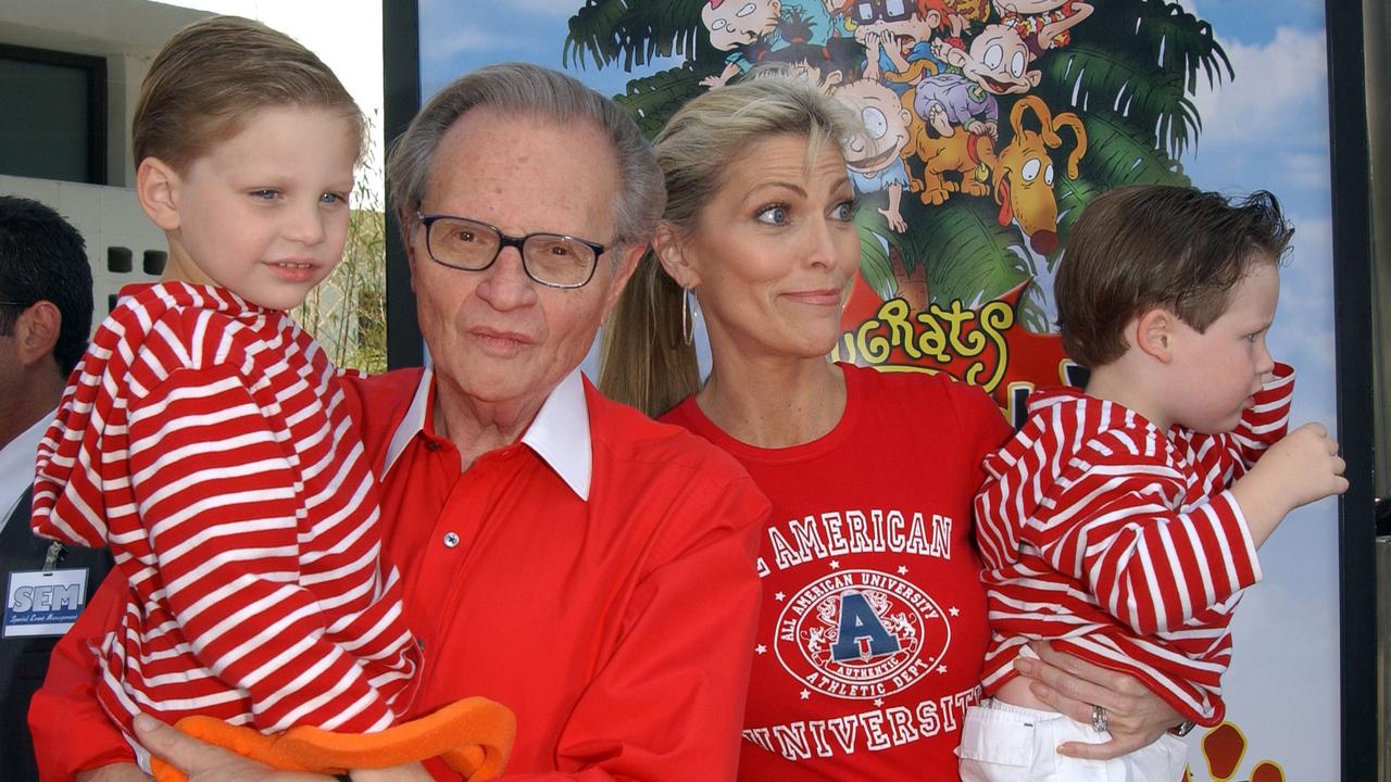 Larry King and his wife Shawn Southwick with their sons in 2003. Picture: Chris Delmas/AFP
