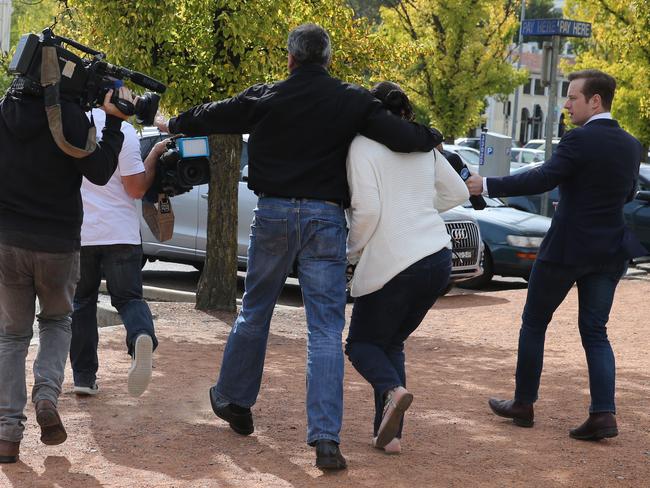 The woman, in the white top, believed to be the mother, has declared her teenage son is not a terrorist. Picture: Ray Strange