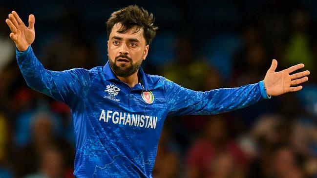 Afghanistan's captain Rashid Khan appeals for a wicket during the match against Australia. Picture: Randy Brooks/AFP