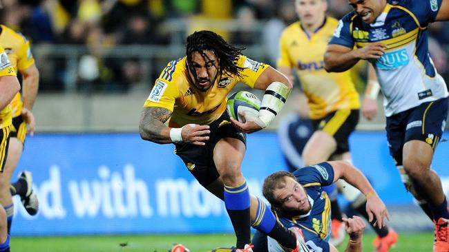 WELLINGTON, NEW ZEALAND - JUNE 27: Ma'a Nonu breaks through a tackle during the Super Rugby Semi Final match between the Hurricanes and the Brumbies at Westpac Stadium on June 27, 2015 in Wellington, New Zealand. (Photo by Mark Tantrum/Getty Images)