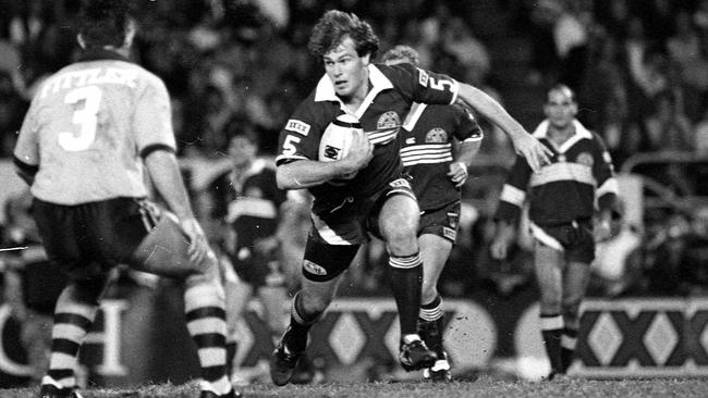 Willie Carne looks to burst through for the Maroons in 1993. Picture: Jim Fenwick