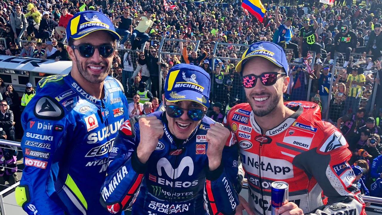 Maverick Vinales (C) won the MotoGP Australian Motorcycle Grand Prix from Andrea Iannone (L) and Andrea Dovizioso (R). Pic: MotoGP