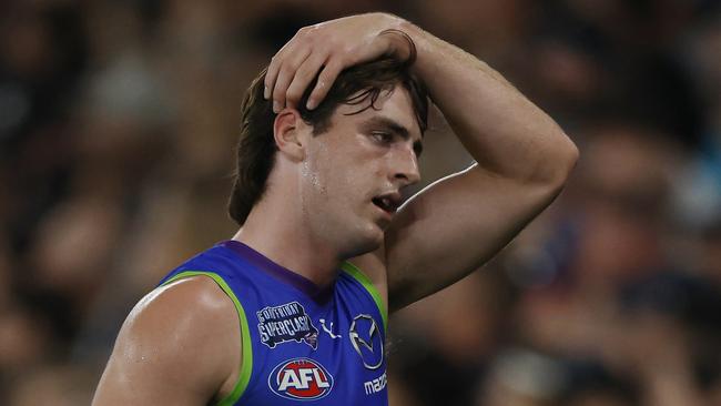 MELBOURNE , AUSTRALIA. March 29, 2024.  AFL . North Melbourne vs Carlton at Marvel Stadium.   George Wardlaw of the Kangaroos comes to the bench during the 3rd qtr.    . Pic: Michael Klein