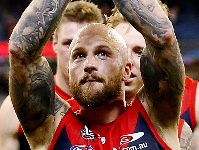 AFL: Round 5 Melbourne v Richmond Nathan Jones leads the Demons off the mcg Picture:Wayne Ludbey